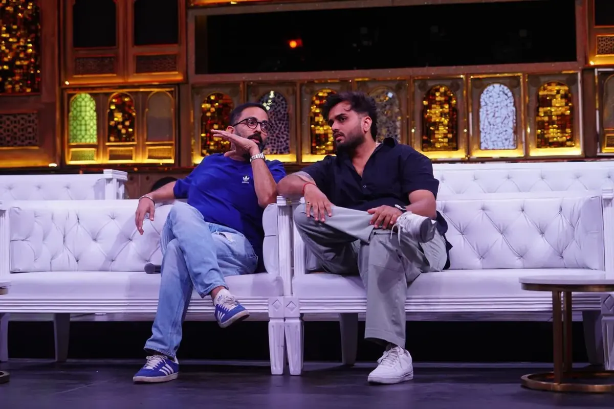 On-Set Stage Briefing & Strategy. Utkarsh conferring with core broadcast collaborators during set preparation., Utkarsh Jayesh Suratwala