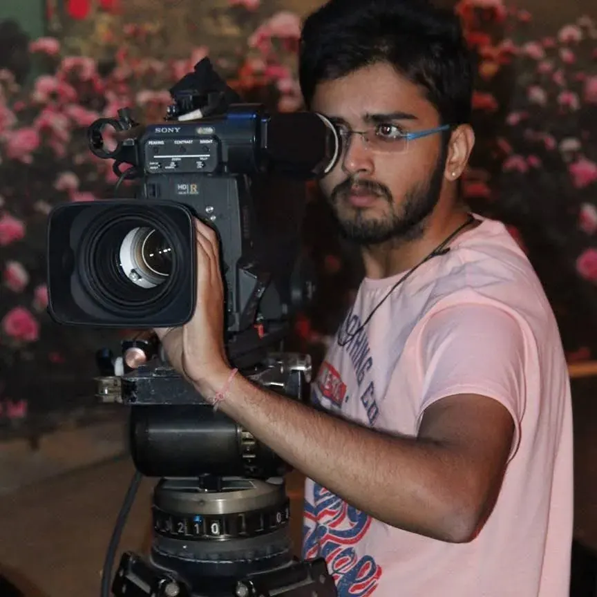 Broadcast Camera Operations & Framing. Utkarsh operating high-end Sony broadcast pedestal camera on television floor., Utkarsh Jayesh Suratwala