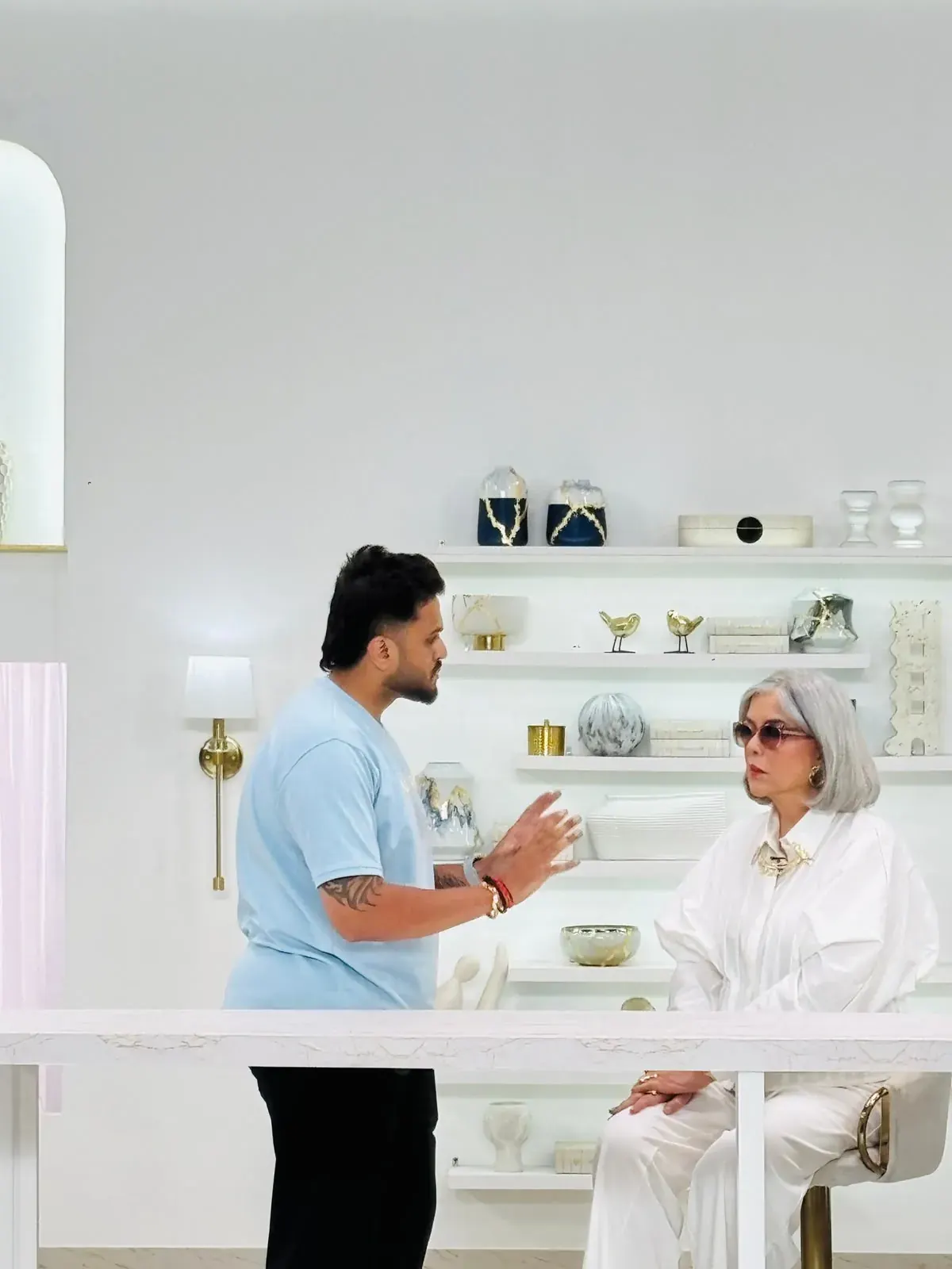 Directing a brand shoot on a white-cyc set, Utkarsh Jayesh Suratwala